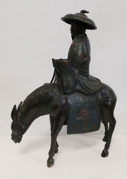 null Toba sur sa mule, Japon, vers 1900
Statuette en bronze à patine brune et émaux...