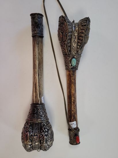 null Two ritual trumpets (Rkang gling or kangling), Tibetan
mounted bone, head of...