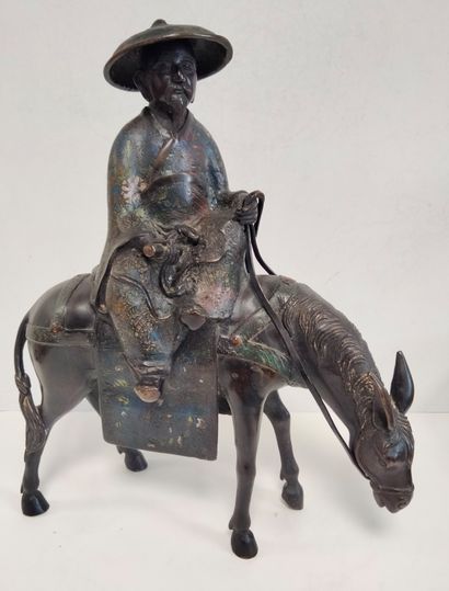 null Toba sur sa mule, Japon, vers 1900
Statuette en bronze à patine brune et émaux...