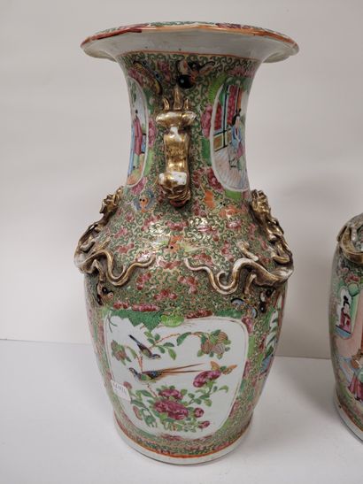 null Pair of porcelain baluster vases, Canton, 19th centuryA
reserve decoration of...