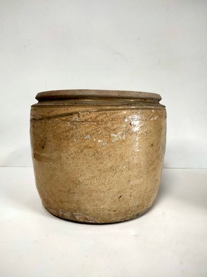 null Two jars, one covered in beige stoneware, one with incised foliage decoration,...