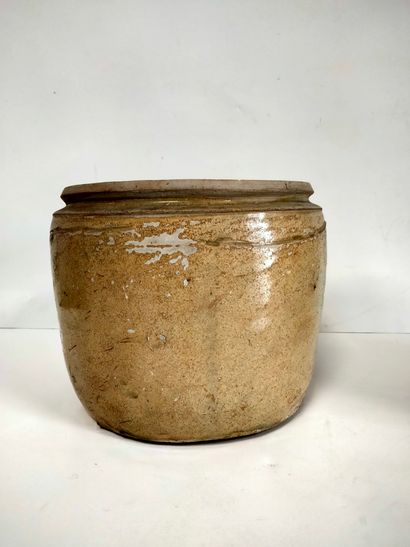 null Two jars, one covered in beige stoneware, one with incised foliage decoration,...