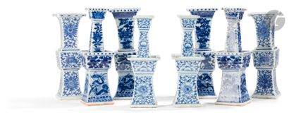 Four pairs of white and blue porcelain candlesticks,...