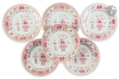 Suite of six round porcelain dishes decorated...