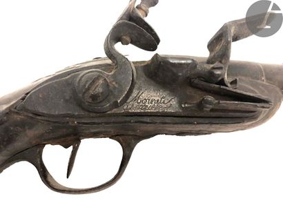 null Flintlock travel pistol.
Round barrel with sides to the thunder. Lock signed...