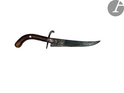 Strong archaic cutlass. Wooden handle. Curved...