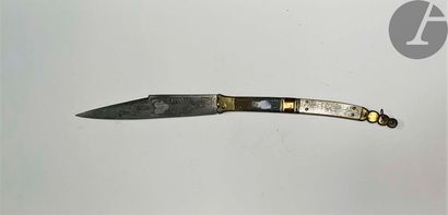 Navaja type folding knife. Brass frame, with...