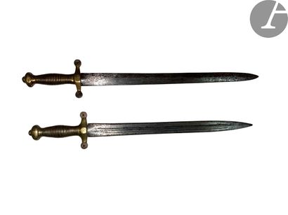 null Two swords of cantinière model 1855. 
Bronze mounts. One blade with gutter,...