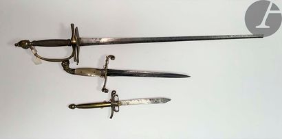 null Three bladed weapons: 
- Uniform sword. Watermarked fuse. Brass mounting, pommel...