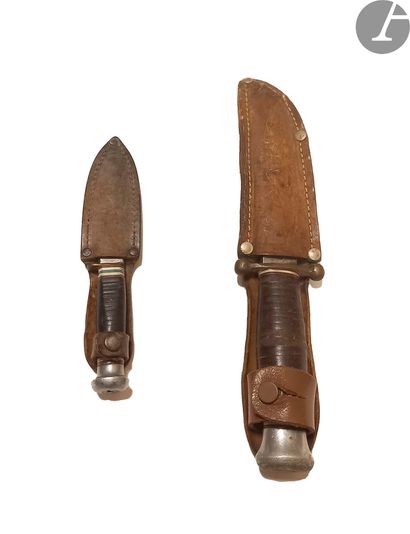 Two knives with leather handle. Aluminium...
