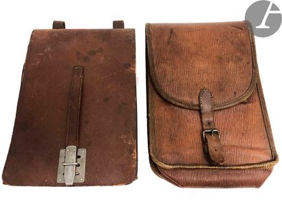 Two brown leather belt pouches, one of which...
