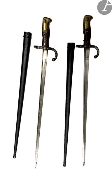 null Two fat bayonets model 1874
:- one Mre d'Armes de St Etienne Xbre 1875. 
- a...