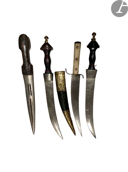 null Four black African daggers. 
Three S.F. Wood and bone handles. 
A.B.E.

