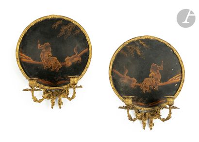 A pair of Parisian varnished and gilt bronze...