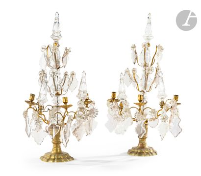 null A pair of ormolu, varnished brass and cut glass half-girandolas, with five arms...