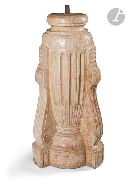 null A Sarrancolin marble base of ogival shape, with flutes, rudentures and scales.
Late...