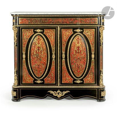  A blackened wood and red tortoiseshell marquetry and engraved brass sideboard opening...