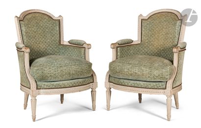 null A pair of moulded, carved and painted beechwood bergères with cabriolet backs...
