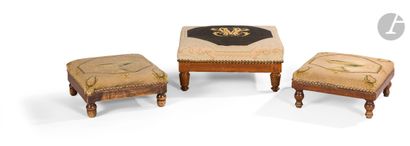 null Three stained wood footstools covered with tapestry, two with neoclassical cup...
