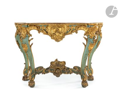 null A painted and gilded wood console table, decorated with rocaille, foliage, cartouche...