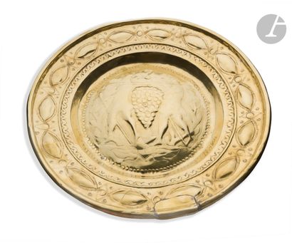 Brass offering dish, stamped, embossed and...