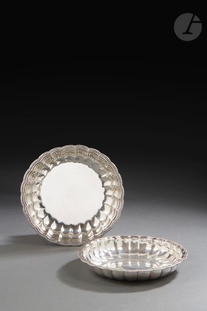 null PARIS 1726 - 1727
A pair of circular dishes with ribs successively molded with...