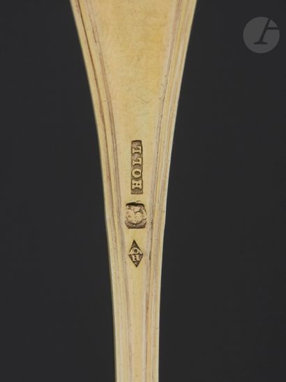null STRASBOURG XIXth CENTURY AFTER 1838
Twelve silver gilt jam spoons in a rectangular...