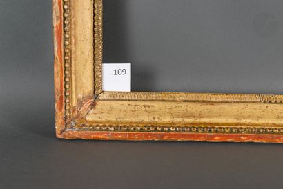null 
Frame in molded oak and gilded stucco decorated with pearls and raisins on...