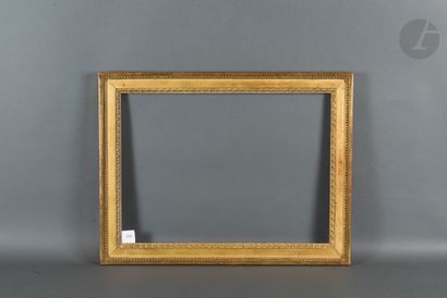 null Carved and gilded oak frame decorated with pearls and grapes, stamped E.L.INFROIT...