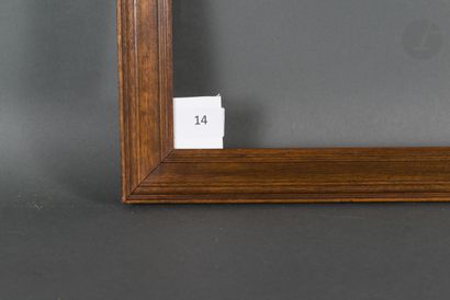  Cadre à cassetta en bois mouluré et teinté. Début du XXe siècle. 36,2 x 47,9 cm...