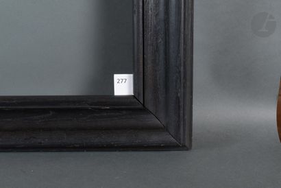 null Frame in molded and blackened oak.
19th century (modified in its dimensions).
67,5...