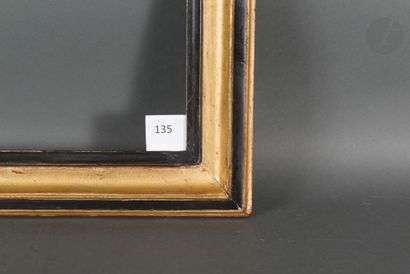 null Baguette en chêne mouluré noir et or.
Époque Louis XVI (restaurations).
45,8 x 60 cm...