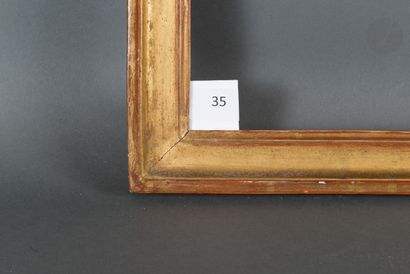 null Gorge en bois mouluré et doré.
Époque Louis XVI (usures).
32,3 x 37,5 cm - Profil :...
