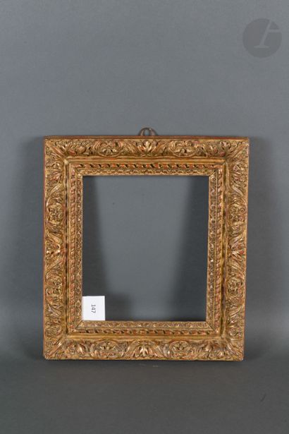 null Carved and gilded oak frame decorated with foliage and ribbons. Louis XIII period...