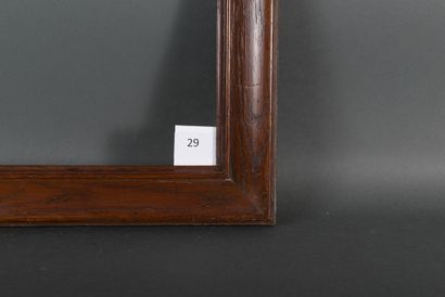  Suite de quatre cadres en chêne mouluré sur une âme en sapin. XIXe siècle. 29,5 x 42,2 cm...