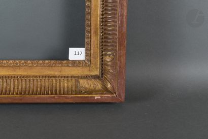null Carved and gilded oak channel frame decorated with acanthus leaves in the corners,...