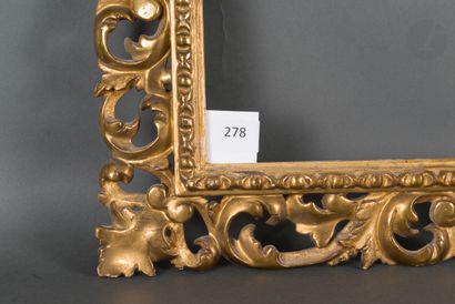 null Carved and gilded wood frame decorated with openwork scrolls of acanthus leaves.
Italy,...