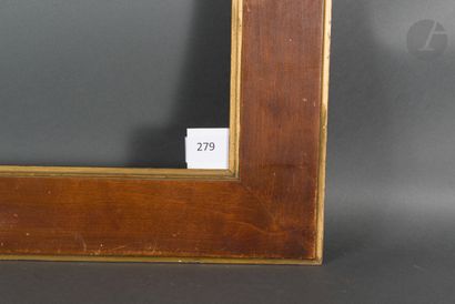 null Flat molded walnut frame with small gilded groove on the outside and doucine...