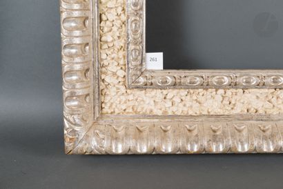 null Carved and silvered wood frame decorated with gadroons and pebbles.
Florence,...