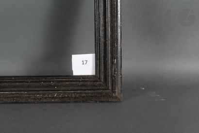  Paire de baguettes en bois mouluré et noirci. XIXe siècle (piqûres). 38,5 x 50 cm...