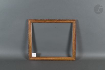 null Baguette en bois mouluré et doré.
Époque Louis XVI (usures).
28,7 x 33,8 cm...