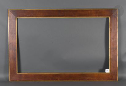 null Flat molded walnut frame with small gilded groove on the outside and doucine...