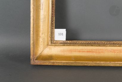 null Gorge en bois mouluré et doré rais-de-cœur en stuc à la vue. Début du XIXe siècle.
40,5 x 56,5 cm...