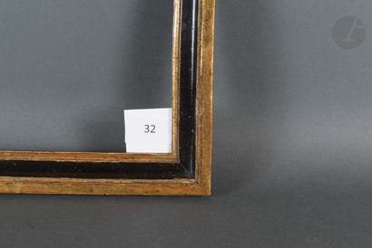 null Baguette en bois mouluré noir et or.
Fin du XVIIIe siècle.
23,8 x 29,8 cm -...