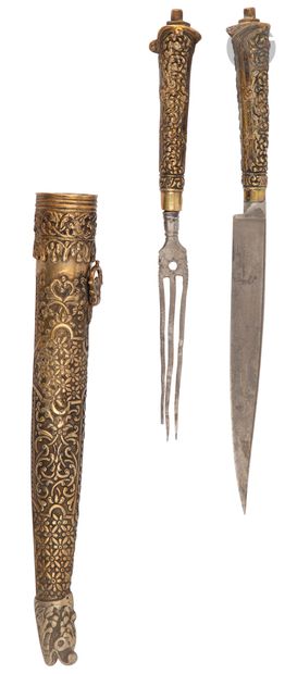 null Hunting set containing a three-pronged fork and a knife. 


In brass and silver...