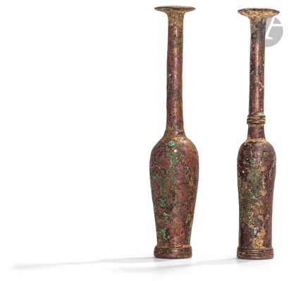  Lot composé de quatre socles d’idoles épingles. Bronze. Louristan, VIII-VIIe siècle...