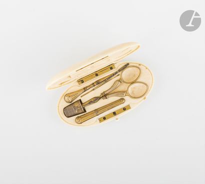 null Sewing kit in gilded metal including: a pair of scissors, a thimble, a needle...