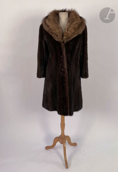 null Set of three pieces: a brown mink coat and fox collar, a black wool coat, gray...