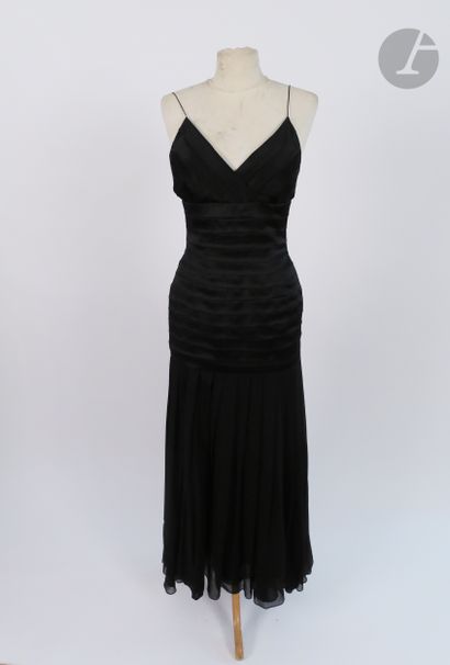 null Anonymous. 

Black pleated satin and chiffon long dress, flower in the back,...