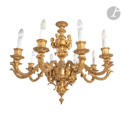 null Gilded bronze chandelier with ten lights decorated with mascaron and busts in...